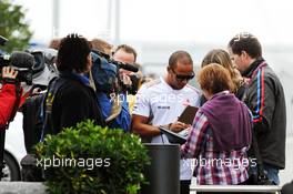 Lewis Hamilton (GBR) McLaren signs autographs for the fans. 19.07.2012. Formula 1 World Championship, Rd 10, German Grand Prix, Hockenheim, Germany, Preparation Day