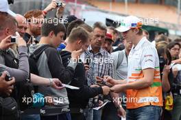 Nico Hulkenberg (GER), Sahara Force India Formula One Team with fans in the pit lane 19.07.2012. Formula 1 World Championship, Rd 10, German Grand Prix, Hockenheim, Germany, Preparation Day