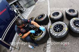 Pirelli tyres prepared by a Scuderia Toro Rosso mechanic. 19.07.2012. Formula 1 World Championship, Rd 10, German Grand Prix, Hockenheim, Germany, Preparation Day