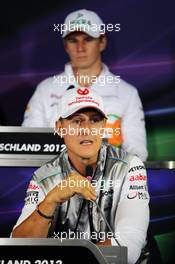 Michael Schumacher (GER) Mercedes AMG F1 and Nico Hulkenberg (GER) Sahara Force India F1 in the FIA Press Conference. 19.07.2012. Formula 1 World Championship, Rd 10, German Grand Prix, Hockenheim, Germany, Preparation Day