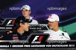 (L to R): Sebastian Vettel (GER) Red Bull Racing and Michael Schumacher (GER) Mercedes AMG F1 in the FIA Press Conference. 19.07.2012. Formula 1 World Championship, Rd 10, German Grand Prix, Hockenheim, Germany, Preparation Day