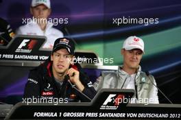 Sebastian Vettel (GER), Red Bull Racing and Michael Schumacher (GER), Mercedes GP 19.07.2012. Formula 1 World Championship, Rd 10, German Grand Prix, Hockenheim, Germany, Preparation Day