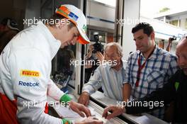 Nico Hulkenberg (GER) Sahara Force India F1 signs autographs for the fans. 19.07.2012. Formula 1 World Championship, Rd 10, German Grand Prix, Hockenheim, Germany, Preparation Day