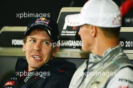 (L to R): Sebastian Vettel (GER) Red Bull Racing and Michael Schumacher (GER) Mercedes AMG F1 in the FIA Press Conference. 19.07.2012. Formula 1 World Championship, Rd 10, German Grand Prix, Hockenheim, Germany, Preparation Day