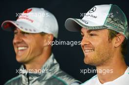 Nico Rosberg (GER) Mercedes AMG F1 (Right) and team mate Michael Schumacher (GER) Mercedes AMG F1 in the FIA Press Conference. 19.07.2012. Formula 1 World Championship, Rd 10, German Grand Prix, Hockenheim, Germany, Preparation Day