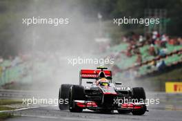 Lewis Hamilton (GBR) McLaren MP4/27 in the wet. 27.07.2012. Formula 1 World Championship, Rd 11, Hungarian Grand Prix, Budapest, Hungary, Practice Day