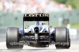 Kimi Raikkonen (FIN) Lotus F1 E20 leaves the pits. 27.07.2012. Formula 1 World Championship, Rd 11, Hungarian Grand Prix, Budapest, Hungary, Practice Day