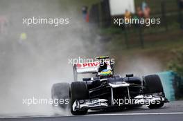 Bruno Senna (BRA) Williams FW34 rejoins the track after running wide in the wet. 27.07.2012. Formula 1 World Championship, Rd 11, Hungarian Grand Prix, Budapest, Hungary, Practice Day