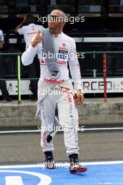 Lewis Hamilton (GBR) McLaren gives the thumbs up in the pits. 27.07.2012. Formula 1 World Championship, Rd 11, Hungarian Grand Prix, Budapest, Hungary, Practice Day