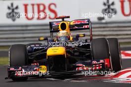 Sebastian Vettel (GER) Red Bull Racing RB8. 27.07.2012. Formula 1 World Championship, Rd 11, Hungarian Grand Prix, Budapest, Hungary, Practice Day