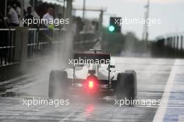 Lewis Hamilton (GBR) McLaren MP4/27 leaves the pits in the wet. 27.07.2012. Formula 1 World Championship, Rd 11, Hungarian Grand Prix, Budapest, Hungary, Practice Day