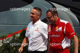 (L to R): Martin Whitmarsh (GBR) McLaren Chief Executive Officer and Stefano Domenicali (ITA) Ferrari General Director leave a meeting with Bernie Ecclestone (GBR) CEO Formula One Group (FOM). 27.07.2012. Formula 1 World Championship, Rd 11, Hungarian Grand Prix, Budapest, Hungary, Practice Day