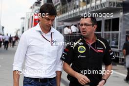 (L to R): Toto Wolff (GER) Williams Non Executive Director with Eric Boullier (FRA) Lotus F1 Team Principal. 27.07.2012. Formula 1 World Championship, Rd 11, Hungarian Grand Prix, Budapest, Hungary, Practice Day