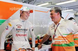 (L to R): Nico Hulkenberg (GER) Sahara Force India F1 with Otmar Szafnauer (USA) Sahara Force India F1 Chief Operating Officer. 29.07.2012. Formula 1 World Championship, Rd 11, Hungarian Grand Prix, Budapest, Hungary, Race Day