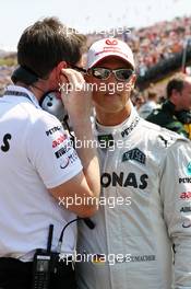 (L to R): Andrew Shovlin (GBR) Mercedes AMG F1 Engineer with Michael Schumacher (GER) Mercedes AMG F1 on the grid. 29.07.2012. Formula 1 World Championship, Rd 11, Hungarian Grand Prix, Budapest, Hungary, Race Day
