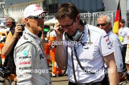 (L to R): Michael Schumacher (GER) Mercedes AMG F1 with Andrew Shovlin (GBR) Mercedes AMG F1 Engineer on the grid. 29.07.2012. Formula 1 World Championship, Rd 11, Hungarian Grand Prix, Budapest, Hungary, Race Day