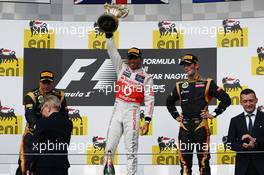 The podium (L to R): Kimi Raikkonen (FIN) Lotus F1 Team, second; Lewis Hamilton (GBR) McLaren, race winner; Romain Grosjean (FRA) Lotus F1 Team, third. 29.07.2012. Formula 1 World Championship, Rd 11, Hungarian Grand Prix, Budapest, Hungary, Race Day