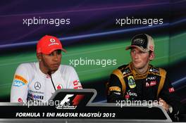 The FIA Press Conference (L to R): Lewis Hamilton (GBR) McLaren, race winner; Romain Grosjean (FRA) Lotus F1 Team, third. 29.07.2012. Formula 1 World Championship, Rd 11, Hungarian Grand Prix, Budapest, Hungary, Race Day