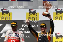 Romain Grosjean (FRA) Lotus F1 Team (Right) celebrates his third position on the podium with race winner Lewis Hamilton (GBR) McLaren. 29.07.2012. Formula 1 World Championship, Rd 11, Hungarian Grand Prix, Budapest, Hungary, Race Day