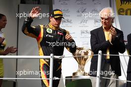 Kimi Raikkonen (FIN) Lotus F1 Team celebrates his second position on the podium. 29.07.2012. Formula 1 World Championship, Rd 11, Hungarian Grand Prix, Budapest, Hungary, Race Day
