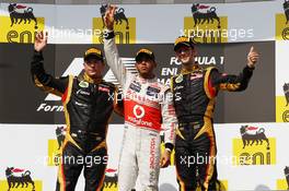 The podium (L to R): Kimi Raikkonen (FIN) Lotus F1 Team, second; Lewis Hamilton (GBR) McLaren, race winner; Romain Grosjean (FRA) Lotus F1 Team, third. 29.07.2012. Formula 1 World Championship, Rd 11, Hungarian Grand Prix, Budapest, Hungary, Race Day