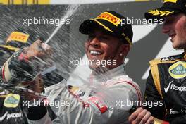 Race winner Lewis Hamilton (GBR) McLaren celebrates on the podium. 29.07.2012. Formula 1 World Championship, Rd 11, Hungarian Grand Prix, Budapest, Hungary, Race Day