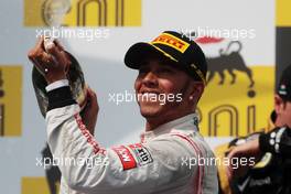 Race winner Lewis Hamilton (GBR) McLaren celebrates on the podium. 29.07.2012. Formula 1 World Championship, Rd 11, Hungarian Grand Prix, Budapest, Hungary, Race Day