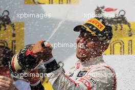 Race winner Lewis Hamilton (GBR) McLaren celebrates on the podium. 29.07.2012. Formula 1 World Championship, Rd 11, Hungarian Grand Prix, Budapest, Hungary, Race Day