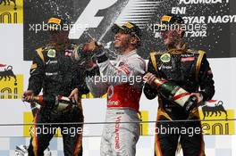 Race winner Lewis Hamilton (GBR) McLaren celebrates on the podium. 29.07.2012. Formula 1 World Championship, Rd 11, Hungarian Grand Prix, Budapest, Hungary, Race Day