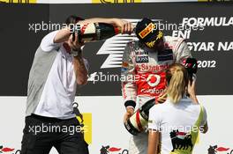Race winner Lewis Hamilton (GBR) McLaren celebrates on the podium with Sam Michael (AUS) McLaren Sporting Director. 29.07.2012. Formula 1 World Championship, Rd 11, Hungarian Grand Prix, Budapest, Hungary, Race Day