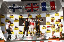 The podium (L to R): Kimi Raikkonen (FIN) Lotus F1 Team, second; Lewis Hamilton (GBR) McLaren, race winner; Romain Grosjean (FRA) Lotus F1 Team, third. 29.07.2012. Formula 1 World Championship, Rd 11, Hungarian Grand Prix, Budapest, Hungary, Race Day