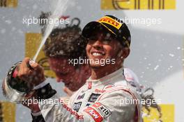 Race winner Lewis Hamilton (GBR) McLaren celebrates on the podium. 29.07.2012. Formula 1 World Championship, Rd 11, Hungarian Grand Prix, Budapest, Hungary, Race Day