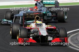 Pedro De La Rosa (ESP) HRT Formula 1 Team F112 leads Michael Schumacher (GER) Mercedes AMG F1 W03. 29.07.2012. Formula 1 World Championship, Rd 11, Hungarian Grand Prix, Budapest, Hungary, Race Day
