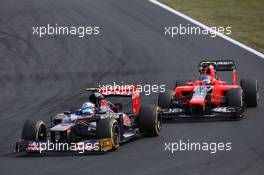 Jean-Eric Vergne (FRA), Scuderia Toro Rosso and Charles Pic (FRA), Marussia F1 Team  29.07.2012. Formula 1 World Championship, Rd 11, Hungarian Grand Prix, Budapest, Hungary, Race Day