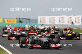 Lewis Hamilton (GBR) McLaren MP4/27 leads at the start of the race. 29.07.2012. Formula 1 World Championship, Rd 11, Hungarian Grand Prix, Budapest, Hungary, Race Day