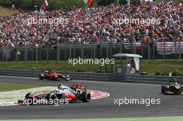 Lewis Hamilton (GBR), McLaren Mercedes leads rgp 2" 29.07.2012. Formula 1 World Championship, Rd 11, Hungarian Grand Prix, Budapest, Hungary, Race Day