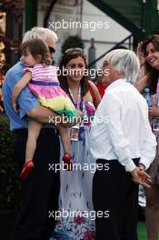Charlie Whiting (GBR) FIA Delegate and his family with Bernie Ecclestone (GBR) CEO Formula One Group (FOM). 28.07.2012. Formula 1 World Championship, Rd 11, Hungarian Grand Prix, Budapest, Hungary, Qualifying Day