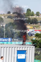 A generator suffers an internal fire. 28.07.2012. Formula 1 World Championship, Rd 11, Hungarian Grand Prix, Budapest, Hungary, Qualifying Day