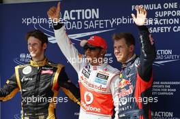 Qualifying parc ferme top three (L to R): Romain Grosjean (FRA) Lotus F1 Team, second; Lewis Hamilton (GBR) McLaren, pole position; Sebastian Vettel (GER) Red Bull Racing, third. 28.07.2012. Formula 1 World Championship, Rd 11, Hungarian Grand Prix, Budapest, Hungary, Qualifying Day