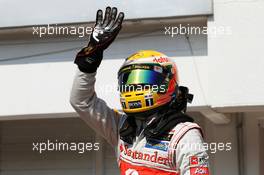 Lewis Hamilton (GBR) McLaren celebrates his pole position in parc ferme. 28.07.2012. Formula 1 World Championship, Rd 11, Hungarian Grand Prix, Budapest, Hungary, Qualifying Day