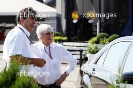 Bernie Ecclestone (GBR) CEO Formula One Group (FOM) with Pasquale Lattuneddu (ITA) of the FOM. 28.07.2012. Formula 1 World Championship, Rd 11, Hungarian Grand Prix, Budapest, Hungary, Qualifying Day