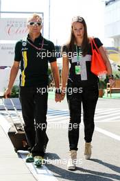 (L to R): Heikki Kovalainen (FIN) Caterham with girlfriend Catherine Hyde (GBR). 28.07.2012. Formula 1 World Championship, Rd 11, Hungarian Grand Prix, Budapest, Hungary, Qualifying Day