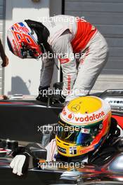 Pole sitter Lewis Hamilton (GBR) McLaren MP4/27 and team mate Jenson Button (GBR) McLaren MP4/27 in parc ferme. 28.07.2012. Formula 1 World Championship, Rd 11, Hungarian Grand Prix, Budapest, Hungary, Qualifying Day