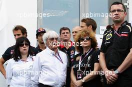 Bernie Ecclestone (GBR) CEO Formula One Group (FOM), drivers and key team personnel pay their respects to the Hungarian GP Promoter Tamas Frank, who died last month. His daughter (Left) is with Bernie. 28.07.2012. Formula 1 World Championship, Rd 11, Hungarian Grand Prix, Budapest, Hungary, Qualifying Day
