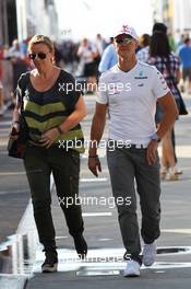 Michael Schumacher (GER) Mercedes AMG F1 with Sabine Kehm (GER) Manager. 28.07.2012. Formula 1 World Championship, Rd 11, Hungarian Grand Prix, Budapest, Hungary, Qualifying Day