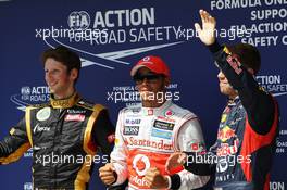 Qualifying parc ferme top three (L to R): Romain Grosjean (FRA) Lotus F1 Team, second; Lewis Hamilton (GBR) McLaren, pole position; Sebastian Vettel (GER) Red Bull Racing, third. 28.07.2012. Formula 1 World Championship, Rd 11, Hungarian Grand Prix, Budapest, Hungary, Qualifying Day