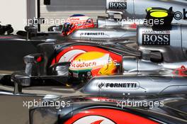 Pole sitter Lewis Hamilton (GBR) McLaren MP4/27 and team mate Jenson Button (GBR) McLaren MP4/27 in parc ferme. 28.07.2012. Formula 1 World Championship, Rd 11, Hungarian Grand Prix, Budapest, Hungary, Qualifying Day