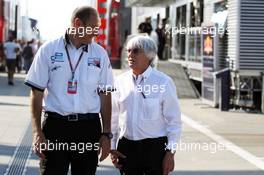 (L to R):  Bruno Michel (FRA) GP2 CEO with Bernie Ecclestone (GBR) CEO Formula One Group (FOM). 28.07.2012. Formula 1 World Championship, Rd 11, Hungarian Grand Prix, Budapest, Hungary, Qualifying Day