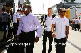 Lewis Hamilton (GBR) McLaren with his father Anthony Hamilton (GBR) and Antti Vierula (FIN) Personal Trainer. 29.07.2012. Formula 1 World Championship, Rd 11, Hungarian Grand Prix, Budapest, Hungary, Race Day