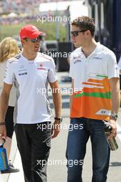 (L to R): Jenson Button (GBR) McLaren with Paul di Resta (GBR) Sahara Force India F1. 29.07.2012. Formula 1 World Championship, Rd 11, Hungarian Grand Prix, Budapest, Hungary, Race Day